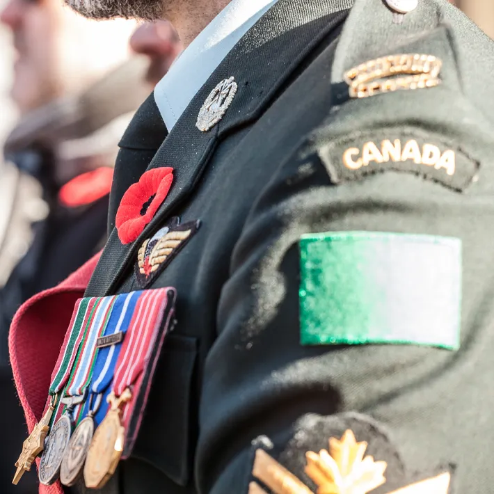 A stock photo of a canadian military soldier wearing badges and medals.