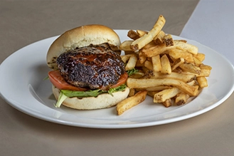 Juicy lamb patty blended with Indian speices on a grilled bioche bun, with sliced tomato and mint mayonnaise.
