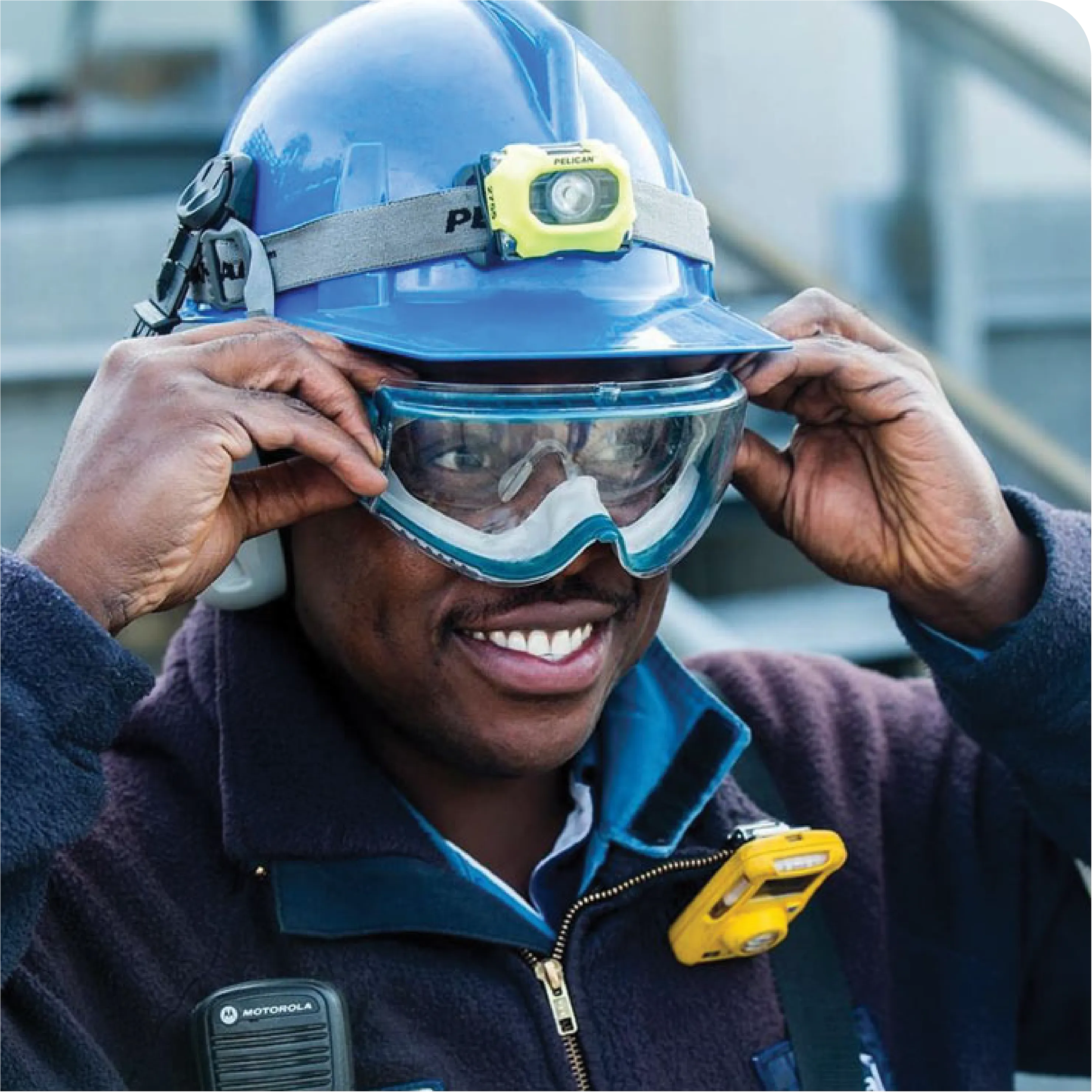 Students-Joshua-Perewei-CPET-2961x2961 An image of an Imperial Oil employee wearing hard hat and safety googles.