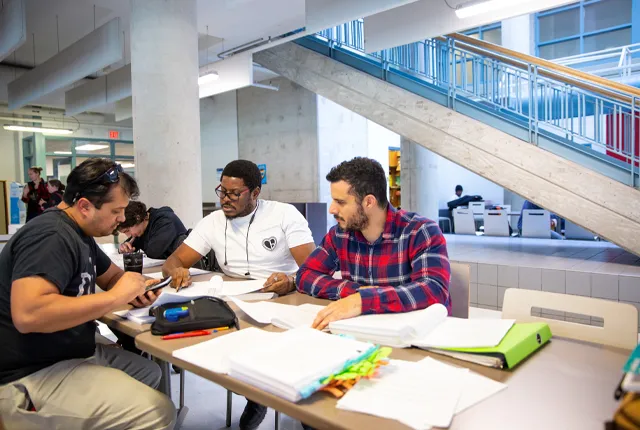 Students studying in the common area.