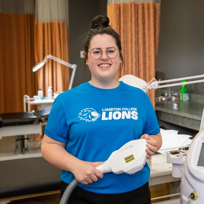 MEAS after graduation photo of student in spa and salon lab.