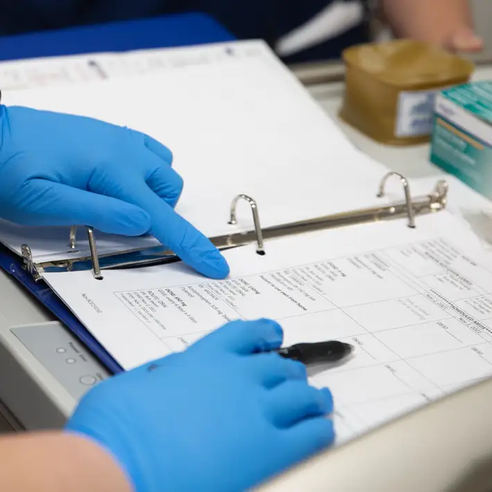 Nurse reviewing paperwork