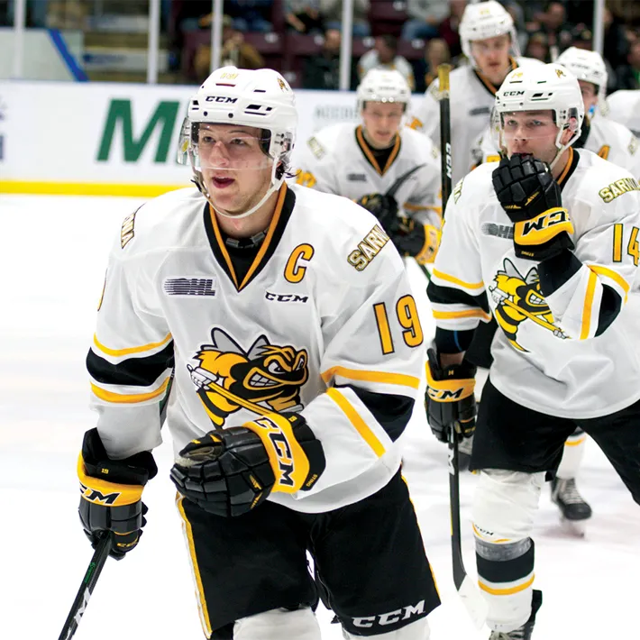 Sarnia Sting hockey team entering the ice rink.