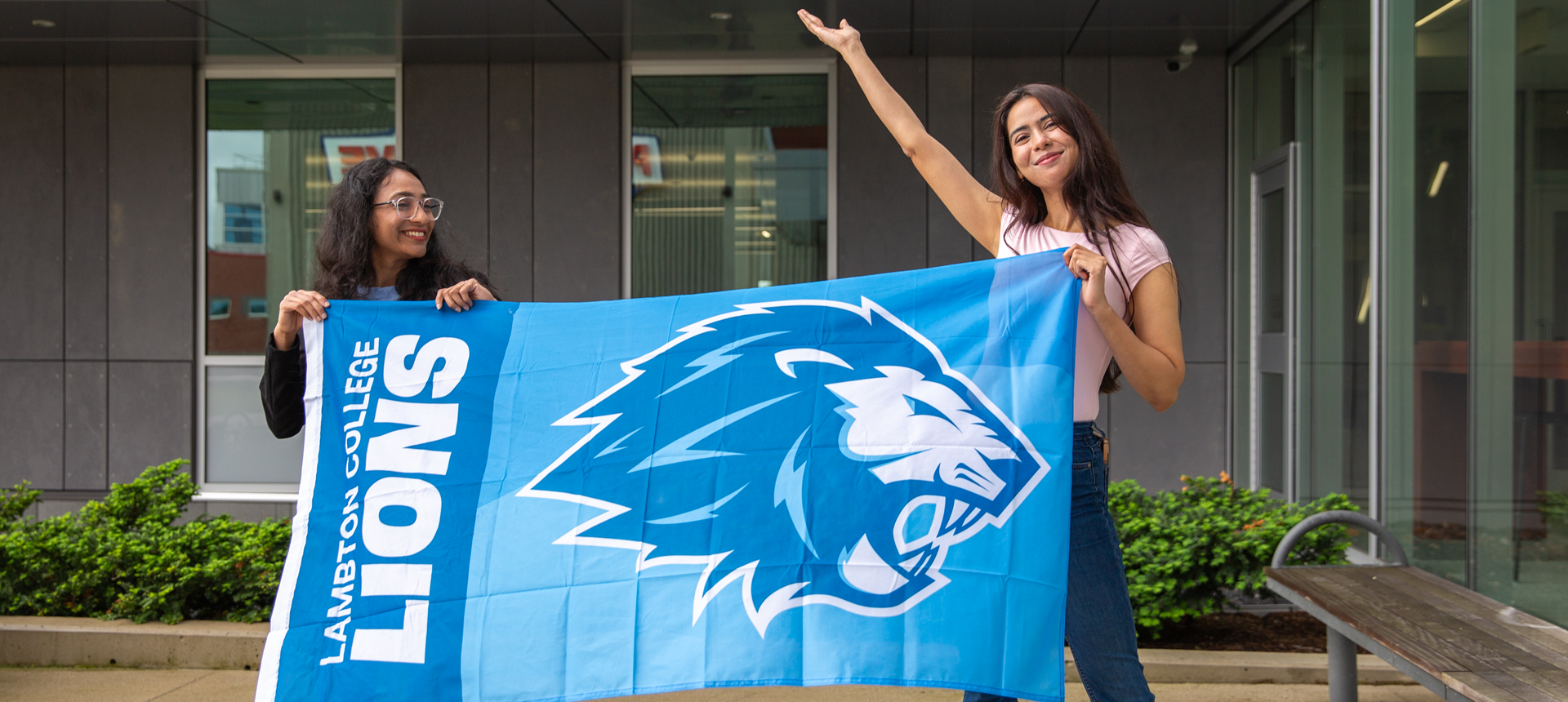 Students holding Lambton Lions Flag