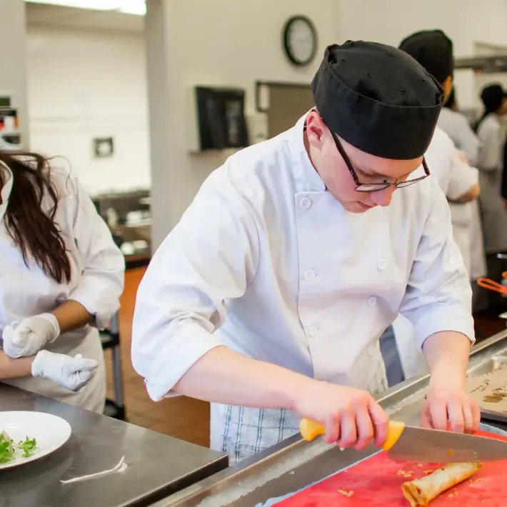 20150409-LambtonCollege87 Two students working together in the kitchen
