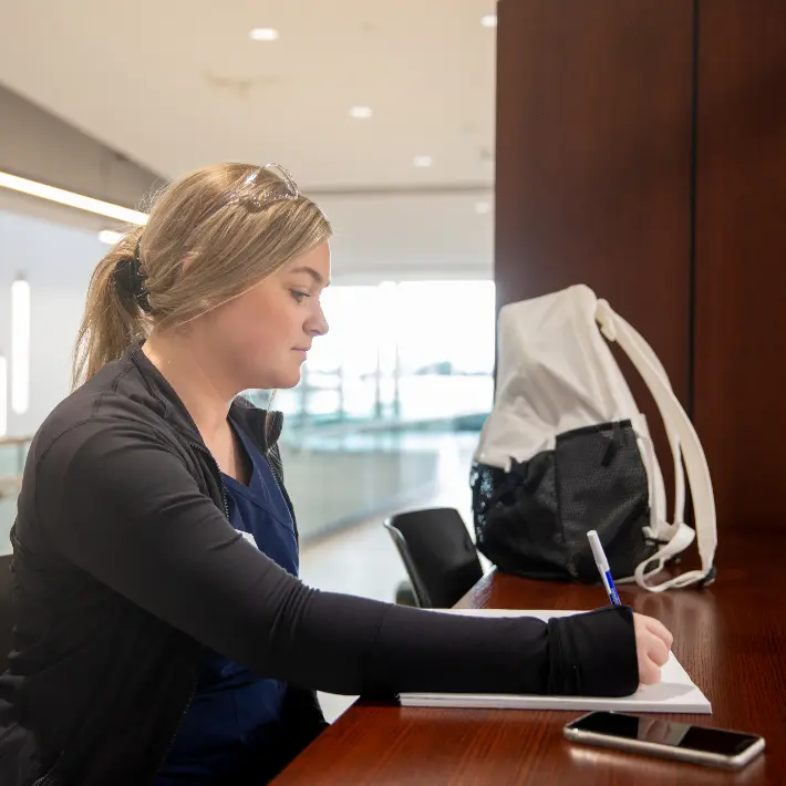 A recruiter helping a student