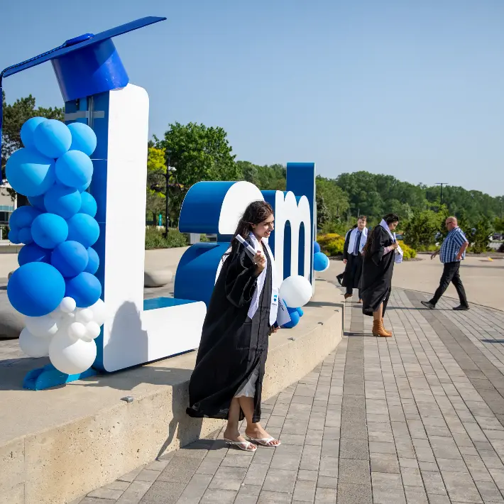 Students working together on a tablet