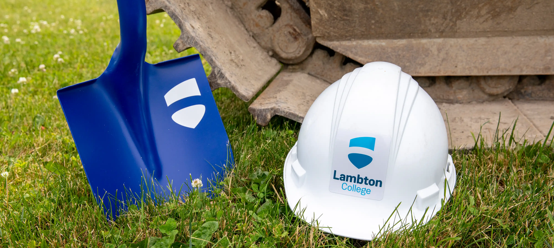 A shovel and hard with Lambton College brand