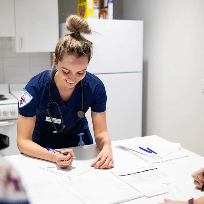 Nurse reviewing paperwork