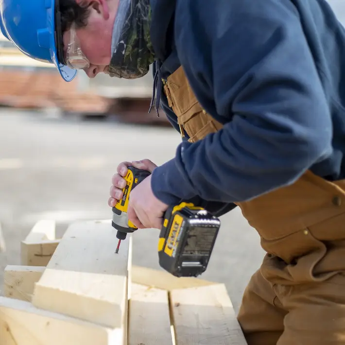 Renovation Technician student using tools