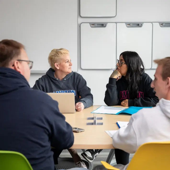 Students in a group work setting